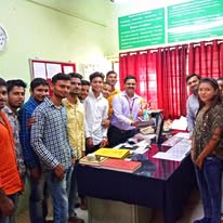Students with the HOD at the department office